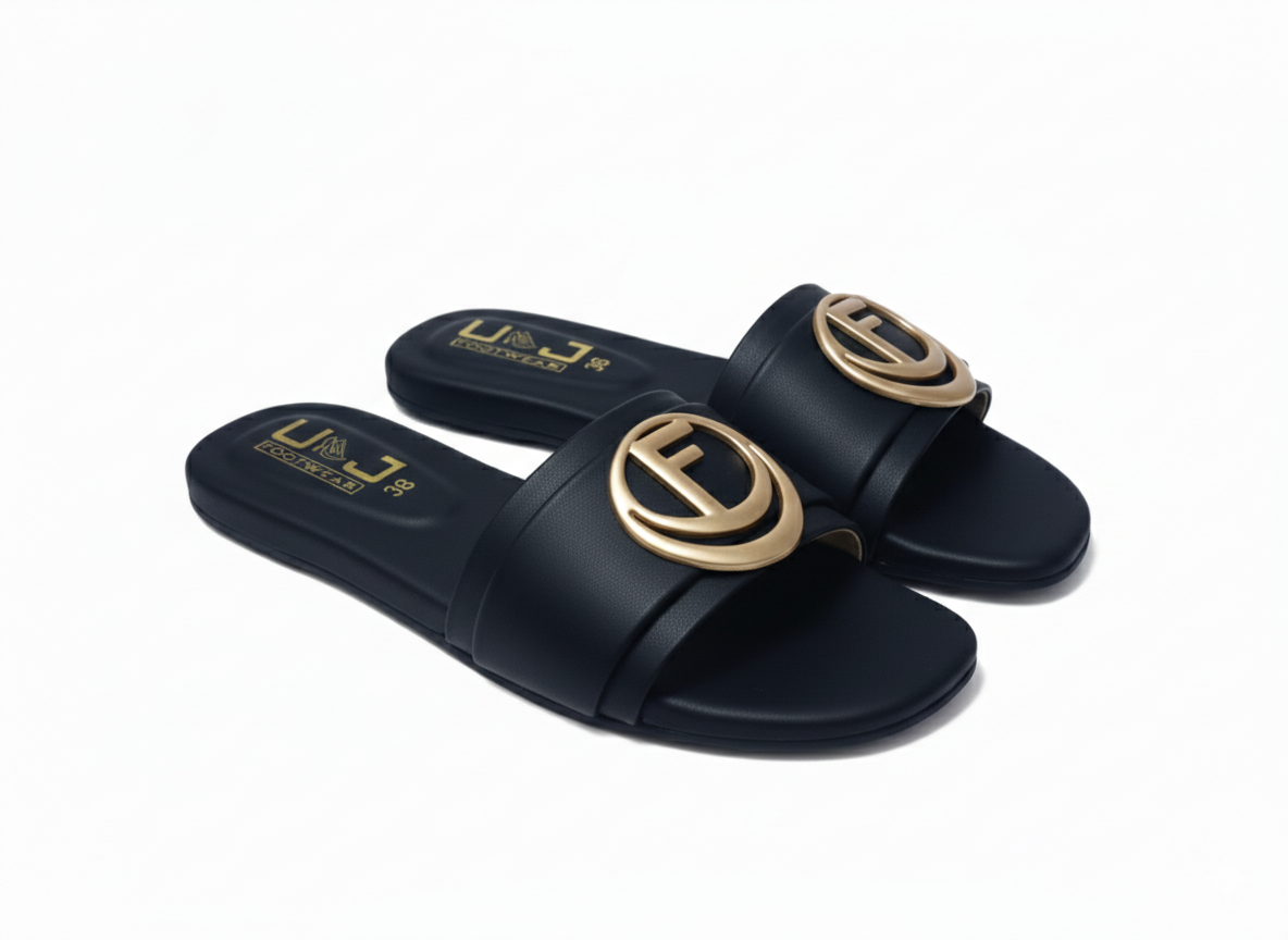 Luxurious Black Slip Ons with Golden Crest Detail