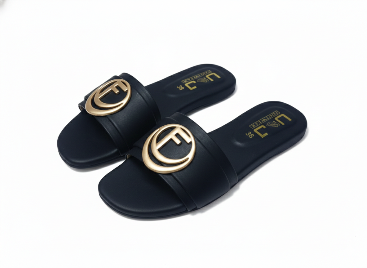 Luxurious Black Slip Ons with Golden Crest Detail
